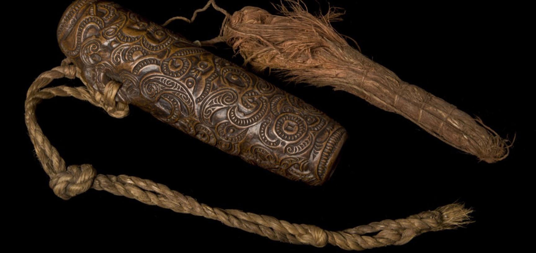 Intricately carved flute.